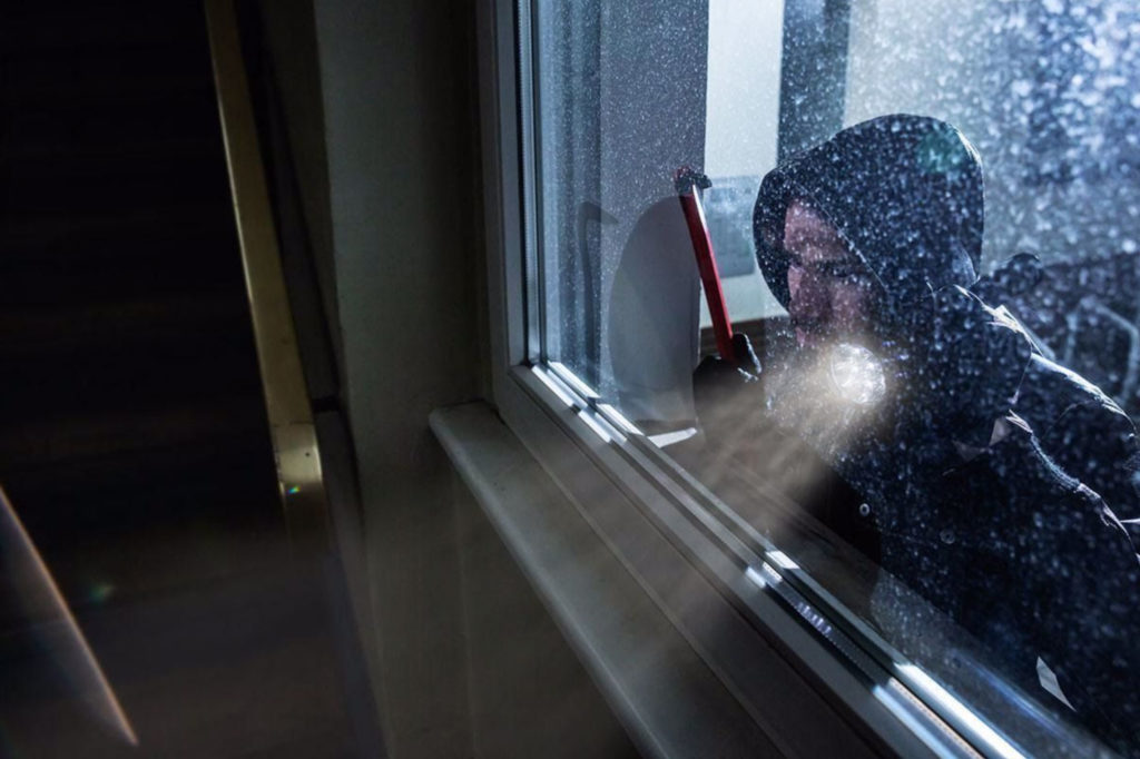 residential security prevent break-ins, someone looking in window